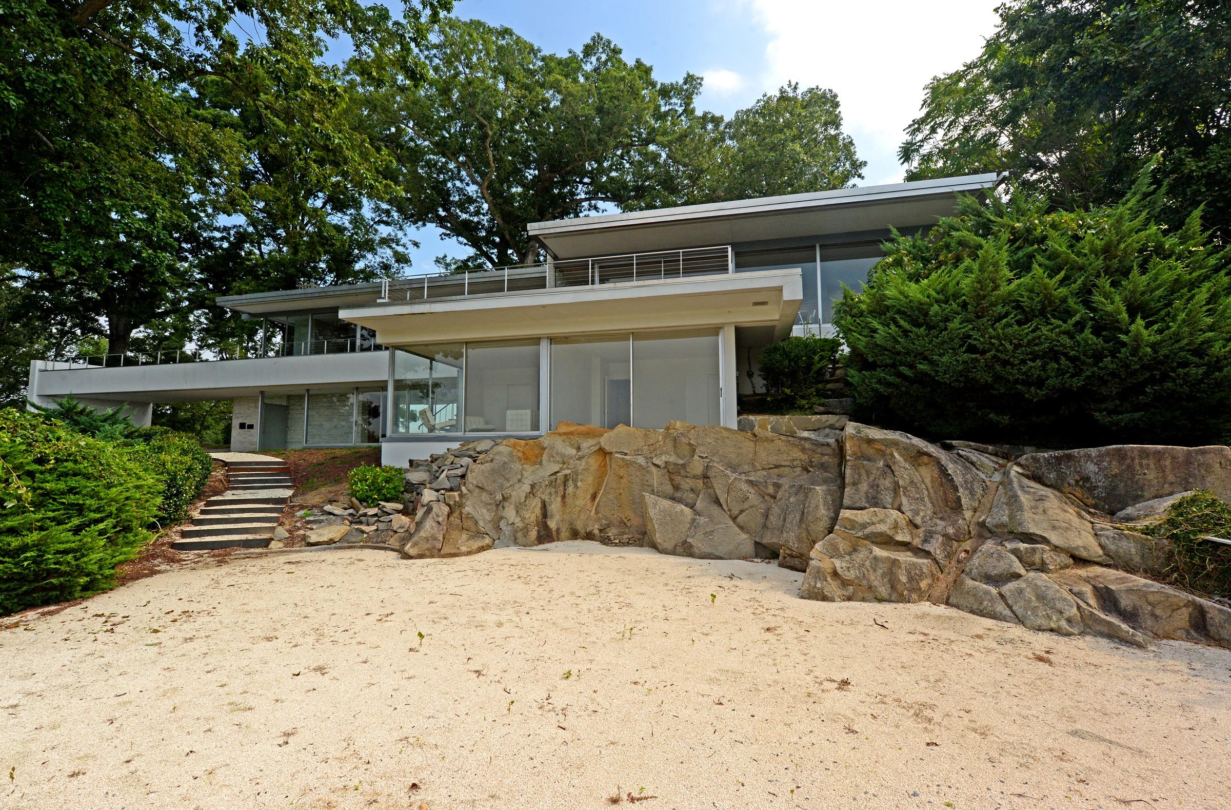 Architecture and nature merge at the landmark house commissioned 50 years ago by Inger and Walter Rice for Dead Man's Hill near Windsor Farms. - SCOTT ELMQUIST