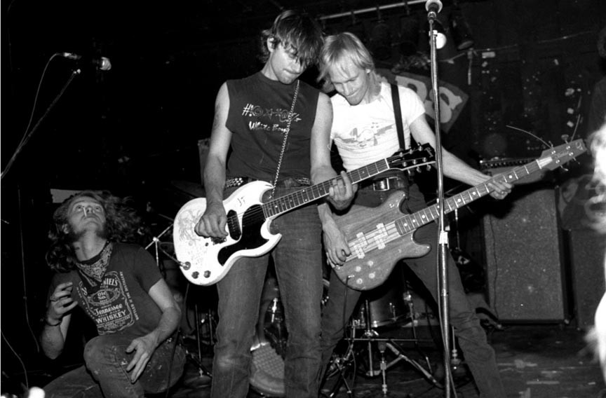 Guitarist Mike Rodriguez, at center, with Wes Freed, left, and Ben Lawes perform as Mudd Helmut at Benny’s in 1986. - CINDY HICKS