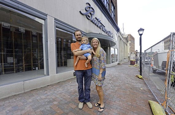 Isaac and Noelle Ward (with son Alcon) are renovating the old Buttersworth’s Building, an art center. - SCOTT ELMQUIST