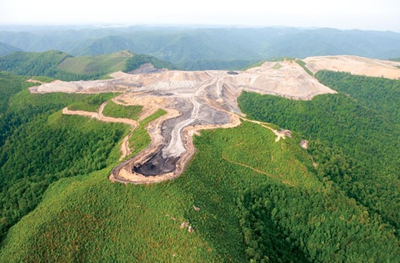 Massey's mountaintop removal surface mining rips apart thousands of acres of hills. - SCOTT ELMQUIST