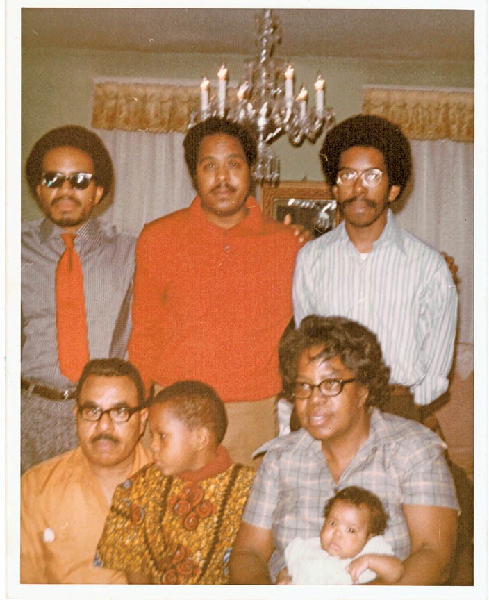 The Smith family at home in the early 1970s. Standing at top are Lonnie Liston Smith Jr., Ray Smith and Donald Smith. Below, from left, are Lonnie Liston Smith Sr., Ray Smith Jr. (Ray’s son), mother Elizabeth Smith and Donald’s daughter Yaisa. - COURTESY OF THE SMITH FAMILY