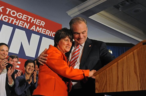 Kaine’s wife, Anne Holton, congratulates the senator-elect after his 2012 victory. - SCOTT ELMQUIST
