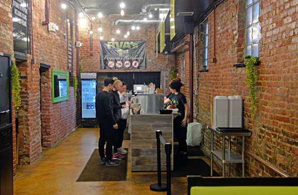 Diners order at a walk-up counter at NuVegan Cafe. - SCOTT ELMQUIST
