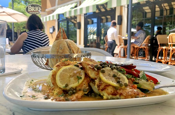 The chicken limone at Brio Tuscan Grille is served with mashed potatoes and roasted veggies. - SCOTT ELMQUIST