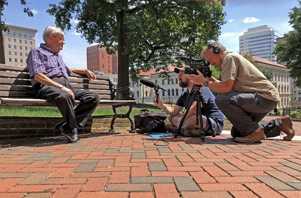 At Capitol Square, Otis Brown shares behind-the-scenes stories about how Virginia handled the Kepone crisis with filmmaker Bernard Crutzen and Jason Roop, assisting. Brown, who served as secretary of health and human services, continued to manage the issue after his retirement in 1977 at the request of Gov. Mills Godwin. - SCOTT ELMQUIST