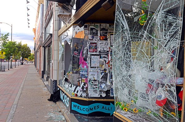The windows of Rumors Boutique at 723 W. Broad St. were smashed during Saturday night’s protest. - SCOTT ELMQUIST