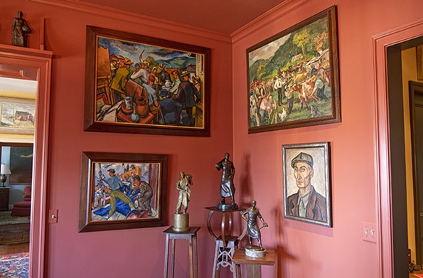 In the dining room. intimate sculptures placed atop arts and crafts-inspired bases share a corner with four paintings. Counterclockwise from top left: “The Auction,” 1938, and “Reading the Blueprint,” (no date) both by Frederick Bushhoz; “Portrait of a WPA Worker” (1936) by Burr Lee Singer; and “The Auction” by Cecil Bell. - SCOTT ELMQUIST