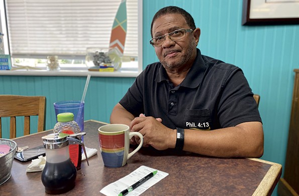 The Rev. K. Lionel Richards, a local pastor, enjoys breakfast at Lenny’s diner. - SCOTT ELMQUIST