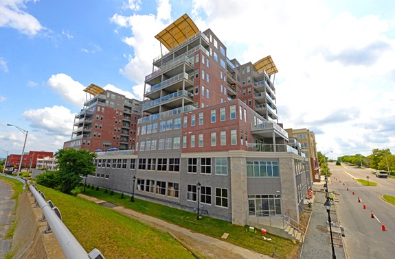 At 800 Semmes Ave. at the south end of the Manchester Bridge, distinctive roofline “sails” mark the Terraces at Manchester, developed by Urban Development Associates. - SCOTT ELMQUIST