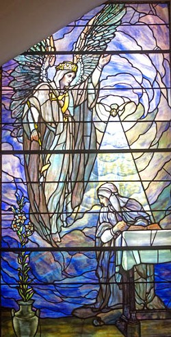 The angel Gabriel informs Mary that she will bear the son of God in this Tiffany Studios window at St. Paul’s Episcopal Church. - SCOTT ELMQUIST