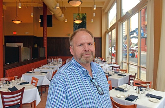 Wright in his restaurant at Broad and Adams streets.