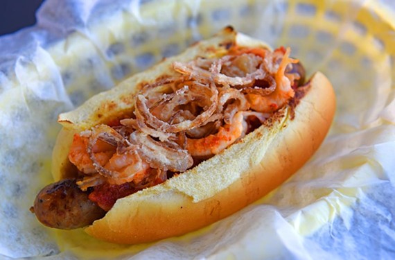 The andouille sausage dog at Stroops Heroic Dogs is a combination of the classic Louisiana sausage mixed with dates and topped with crawfish to create a stellar blend of New Orleans-style flavors.