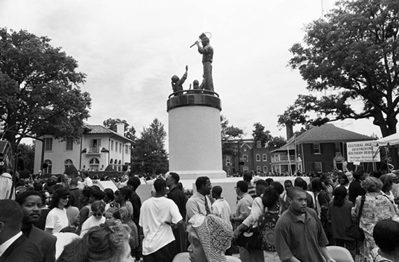 Supporters and protesters gather at the Arthur Ashe statue on July 10, 1996, at its unveiling on what would have been the tennis star’s 53rd birthday. He died in 1993.
