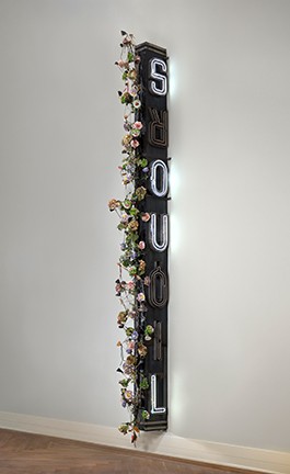 Nari Ward, “Xquisite Liquorsoul,” 2009, metal and neon sign, wood with artificial flowers, shoelaces, shoe tips. - VIRGINIA MUSEUM OF FINE ARTS