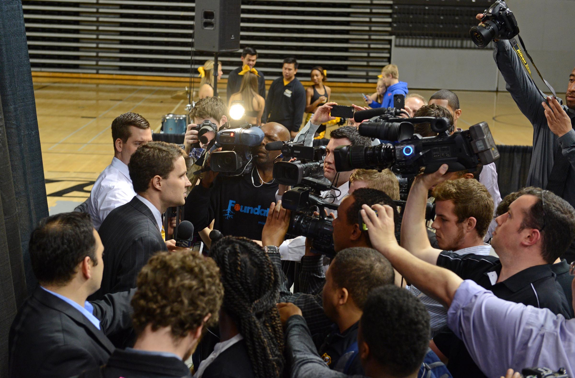 After the announcement of his hiring April 7, Wade answers questions from a horde of media. He replaced his friend, beloved coach Shaka Smart, who helped put VCU basketball on the national map. - SCOTT ELMQUIST