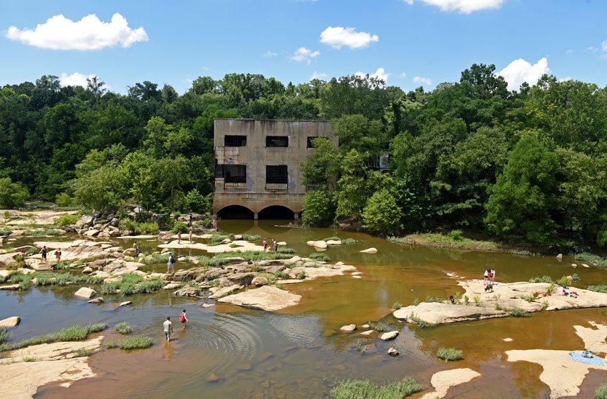 A former hydroelectric plant on the eastern end of Belle Isle rises from a popular swimming hole. - SCOTT ELMQUIST