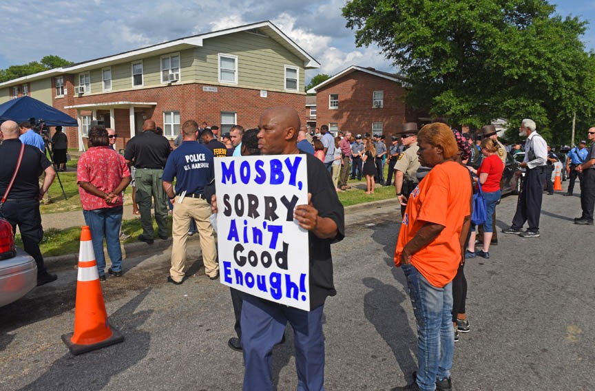On Memorial Day, a vigil for Virginia State Police Special Agent Michael T. Walter was held at Mosby Court. He was shot while on patrol. - SCOTT ELMQUIST