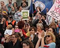 Women’s rights protestors gather on the steps of the State Capitol on March 3, aided in part by former members of Occupy Richmond.