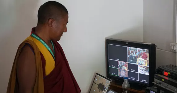 Buddhist monk Geshe Lobzang Samstan oversees the Kalachakra ceremony livestream. - CHRISTOPHER HELLAND