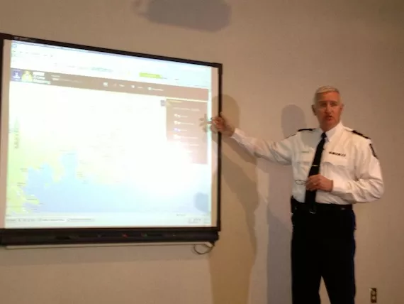 Deputy police chief Bill Moore demonstrates how to use the new crime mapping website for reporters.