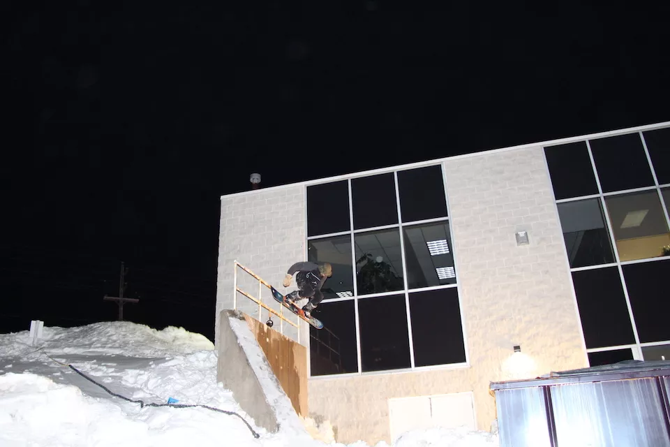 MacArthur catches some air, the bungee cord in the snowbank helped him get enough speed. - AARON WILLIAMS