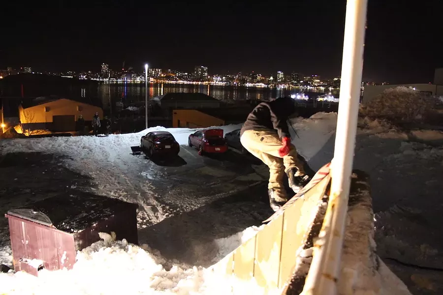 On a test run, Corey Houde slides up the cement retaining wall. - AARON WILLIAMS