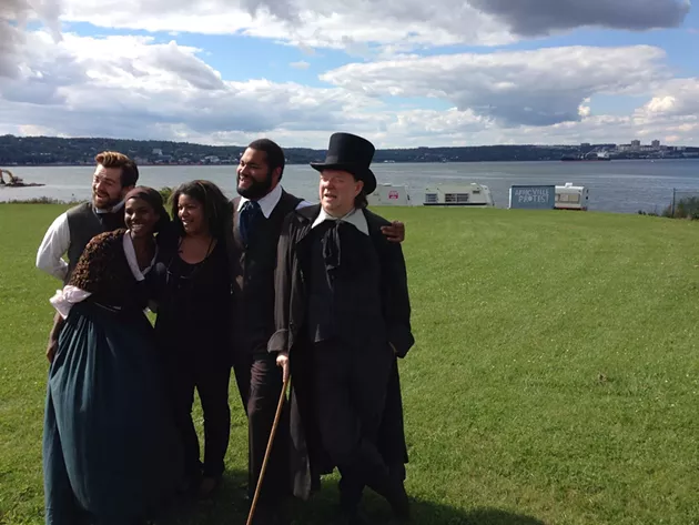 The cast and director of Settling Africville on the present-day site.