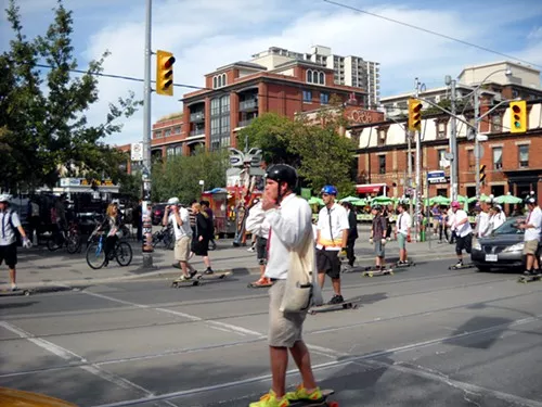 Then I ran into this mob skateboarding through traffic on Queen Street. Not sure why.