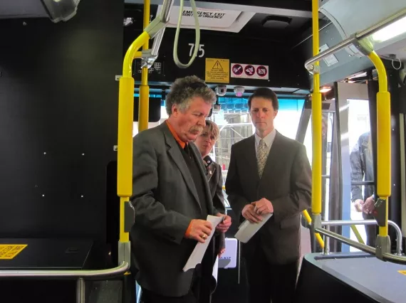 Transportation minister Bill Estabrooks (left) with Halifax mayor Peter Kelly (right). That's Metro Transit manager Pat Soanes squeezed in between.