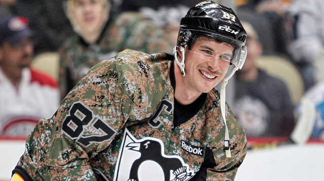 Pittsburgh Penguins captain Sidney Crosby wearing a camo jersey to honour military veterans during a hockey game last November. - VIA NHL.COM