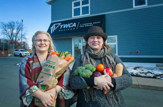 Spyfield market coordinator Twyla Nichols and Mobile Food Market client and volunteer, Kim O'Connell - LENNY MULLINS