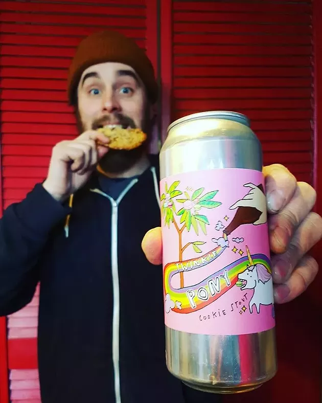 Brad Wilkinson, who brewed Twinkle Pony, poses for a photo. Label design by Nicole Giancomantonio. - PETER BURBRIDGE