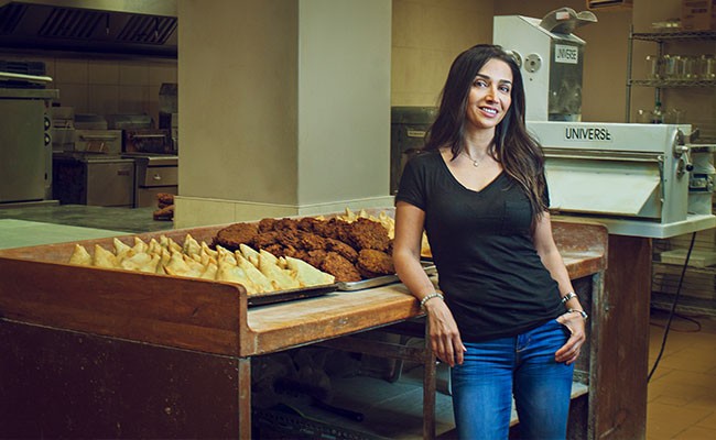 Fran Shirazi has been selling over-sized, golden samosas for 14 years. - LENNY MULLINS