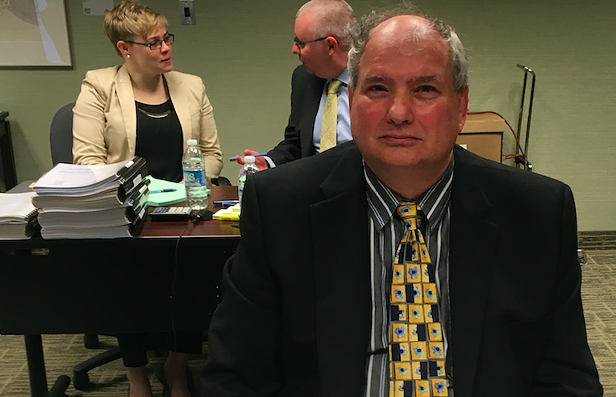 HRM lawyer Randolph Kinghorne at the hearing for damages and remedies. Behind, Human Rights Commission counsel Jason Cooke and Jennie Pick. - SANDRA C. HANNEBOHM