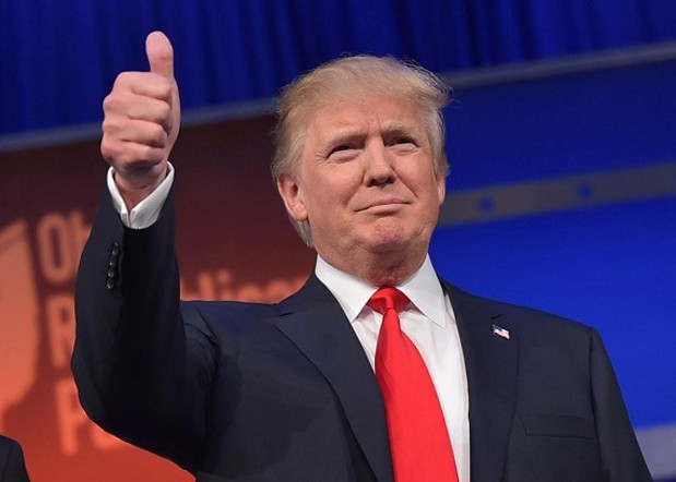 483208412_real_estate_tycoon_donald_trump_flashes_the_thumbs_jpg-magnum.jpg