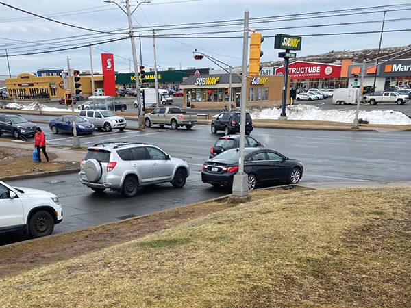 Unpaved sidewalks like the ones pictured above outside Walmart in Bayers Lake make shopping dangerous for people with physical or visiual impairments. - OLUWATOMISIN ADESINA