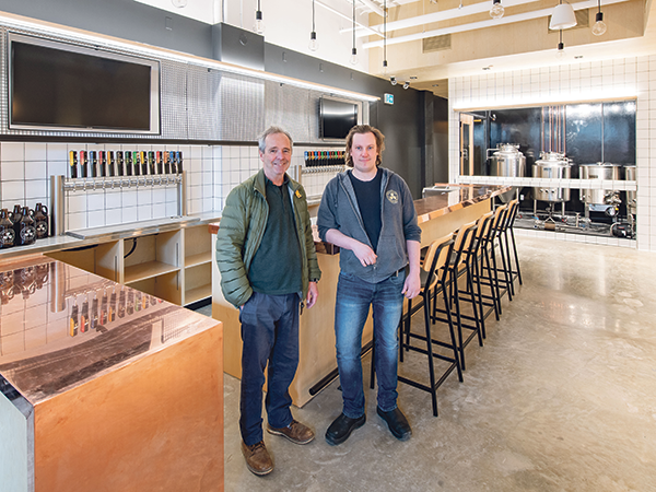 Fill your growlers at John (left) and Mike Allen's newest Propeller location, opening soon on Quinpool. - RYAN WILLIAMS