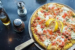 You can't get Sal's pizza made right out the oven, but you can stock up on hand-made dough and make a go at its creations in your own kitchen. - LENNY MULLINS