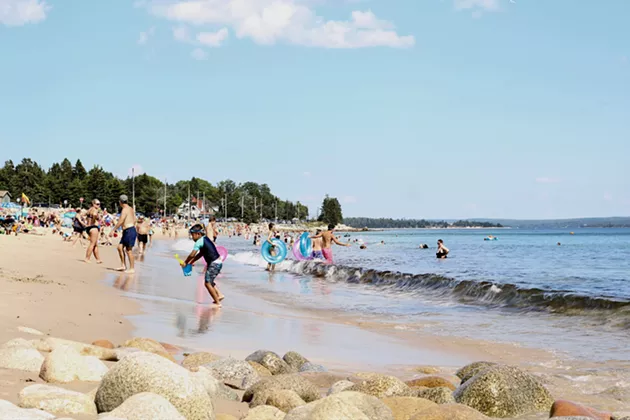 Beaches like Queensland will be a little less packed this summer thanks to social distancing. - VICTORIA WALTON
