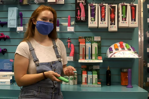 Christine Ollier, education coordinator at Venus Envy, shows off some affordable sex toys. The store delivers for free within a half-hour radius with no minimum purchase, and takes e-transfer. - VICTORIA WALTON