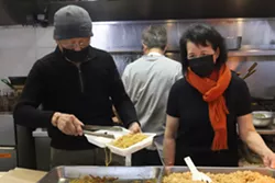 Yi Chiao and Pi Yeng Chen have served food at the market for more than three decades. - VICTORIA WALTON