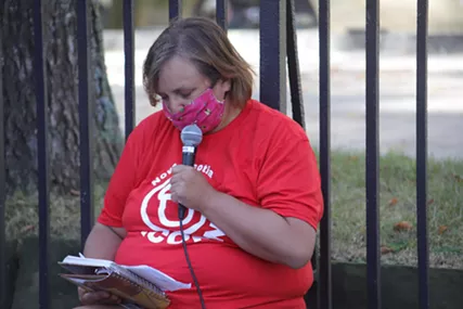 ACORN member Lisa Hayhurst told the crowd how she worries her rent will increase. - VICTORIA WALTON/THE COAST