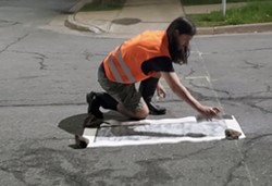 Steve MacKay painted a DIY crosswalk at the Robie Street and Stanley Street intersection at 1am last Friday. - SUBMITTED