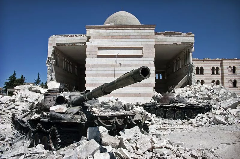 Two destroyed tanks in front of a mosque in Azaz, Syria, the site of a 2012 battle in the ongoing Syrian civil war. - VIA CHRISTIAAN TRIEBERT