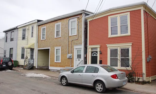 Some of the recently-purchased homes on Fern Lane. At least one resident is still living in one of the properties.