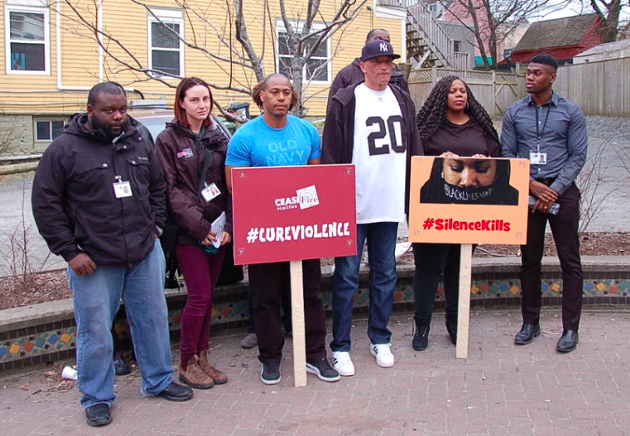 The members of CeaseFire Halifax during last night's rally at Squiggle Park. - MITCHELL MULLEN