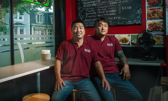 Friends Sang Ho Back and JoungMin Kim are the brains behind tiny culinary gem Backoos Korean Food. - LENNY MULLINS