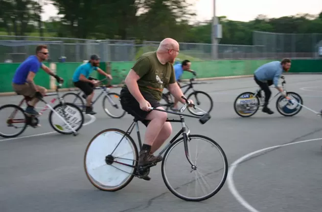 Jeff Mitchell, Leila Kadivar, Curtis Cando and a man known only as Danger play some bike polo - JONATHAN BRIGGINS