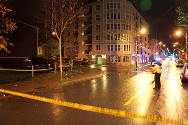 Police officers securing the scene after the November shooting death of 22-year-old Tyler Keizer. - THE COAST
