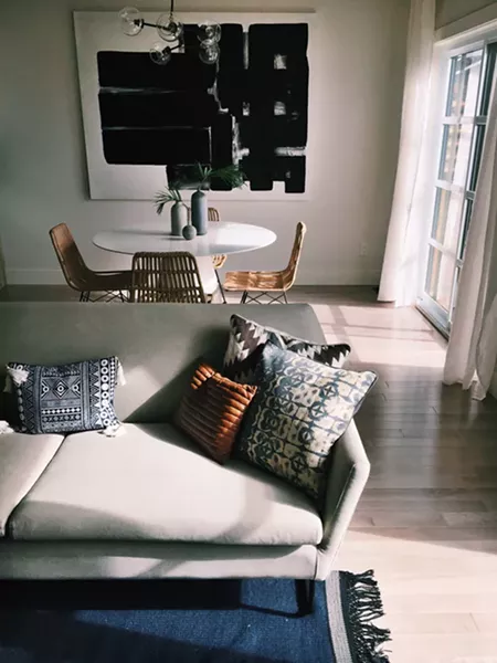 Manning plays with trends using small details like cushions, art and greenery. - BOWERS CONSTRUCTION